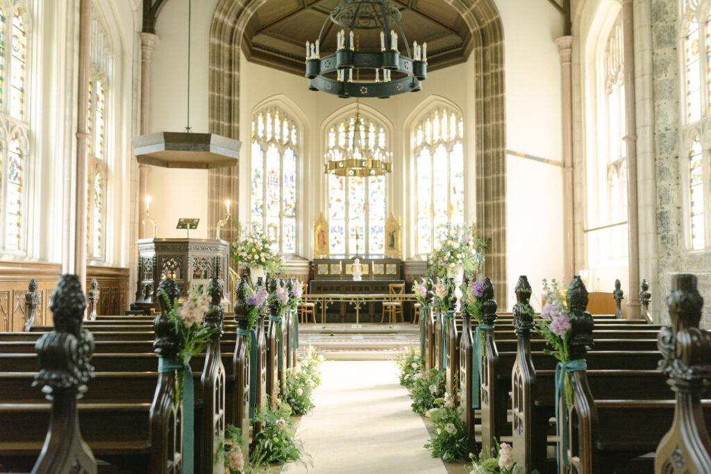Cluny Castle Chapel interior. Flowers by Hays Flowers.