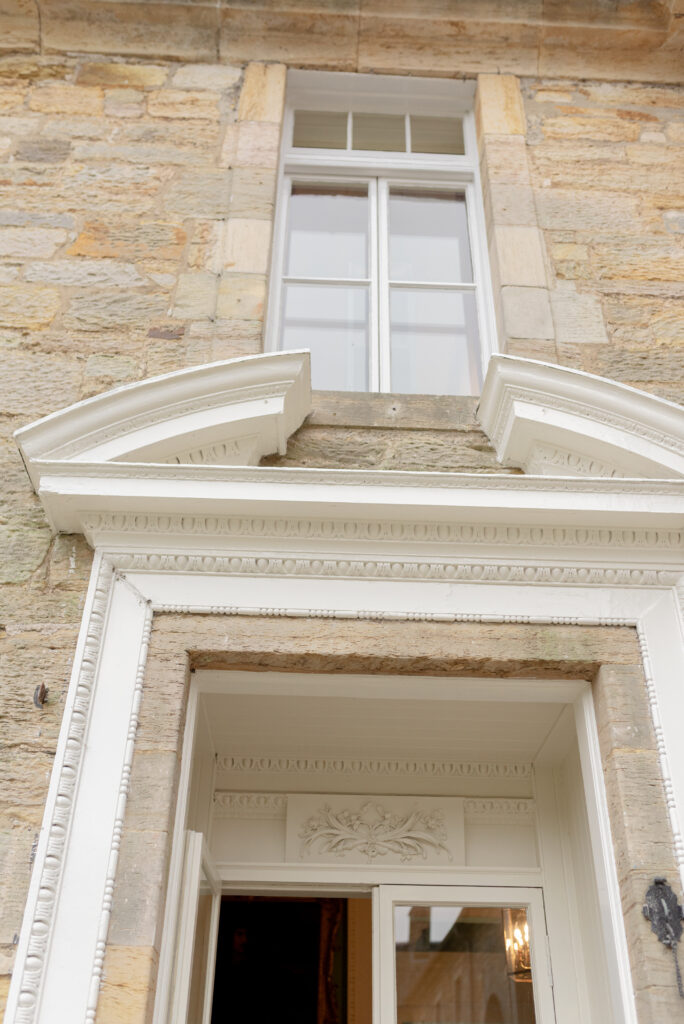 The historic architecture of Penicuik House, Penicuik Estate, Scotland — a private country estate wedding venue near Edinburgh. Image by award winning luxury wedding photographer Scotland, Jill Cherry Porter, in connection with destination wedding planner in Scotland, Timeless White Wedding Planning, and Jill Alexander, abundant wedding florist UK, The Little Flower Atelier.