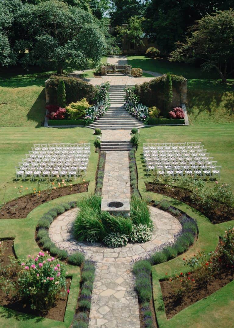 A Scotland outdoor wedding ceremony, private estate wedding ceremony set up designed by luxury wedding planners uk, Matthew Oliver.
