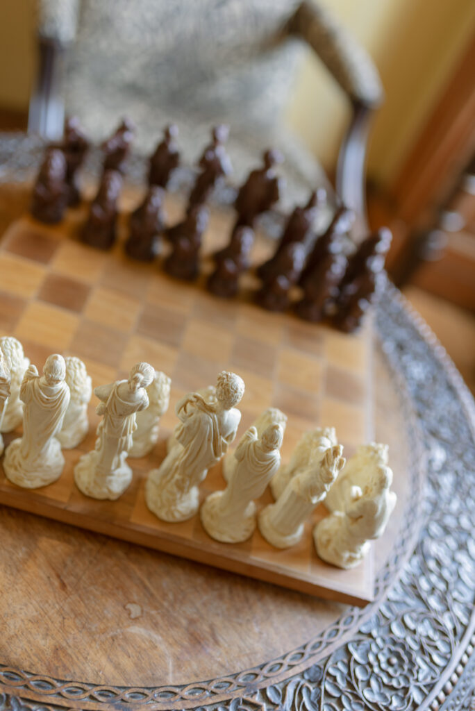 Chess set within the library of Birkhill Castle private wedding venue, Scotland. Image by Scottish wedding photographer Jill Cherry Porter.