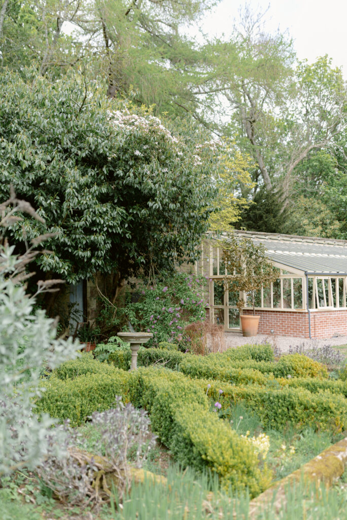 The Glasshouse and walled gardens of Birkhill Castle, an exclusive-use private estate wedding venue in Scotland