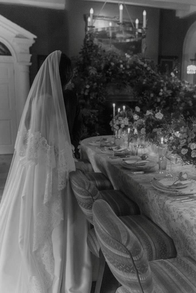 Bride and Groom admire Chatsworth Linens by Chateau Noir Event Hire, in Penicuik House, Scotland.  Wedding Photography by Jill Cherry Porter.