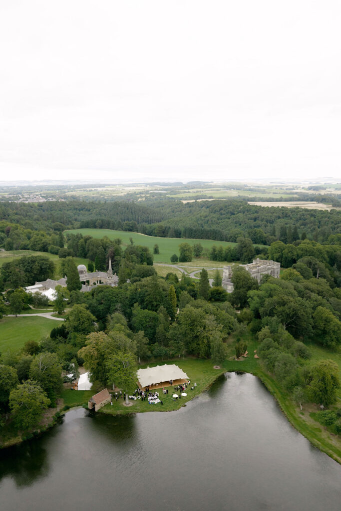 A drinks reception cocktail hour at the High Pond on Penicuik Estate, Scotland destination wedding venue. Image by Penicuik House recommended wedding photographer, Jill Cherry Porter.