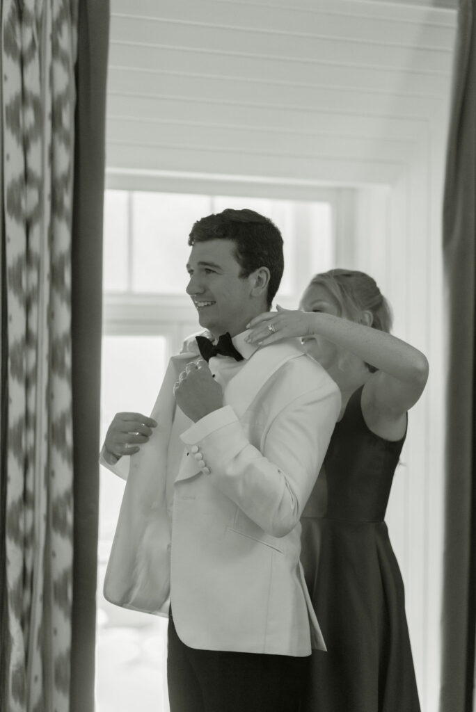 Groom gets ready for wedding at Penicuik Estate, Scotland destination wedding venue. Image by Penicuik House recommended wedding photographer, Jill Cherry Porter.